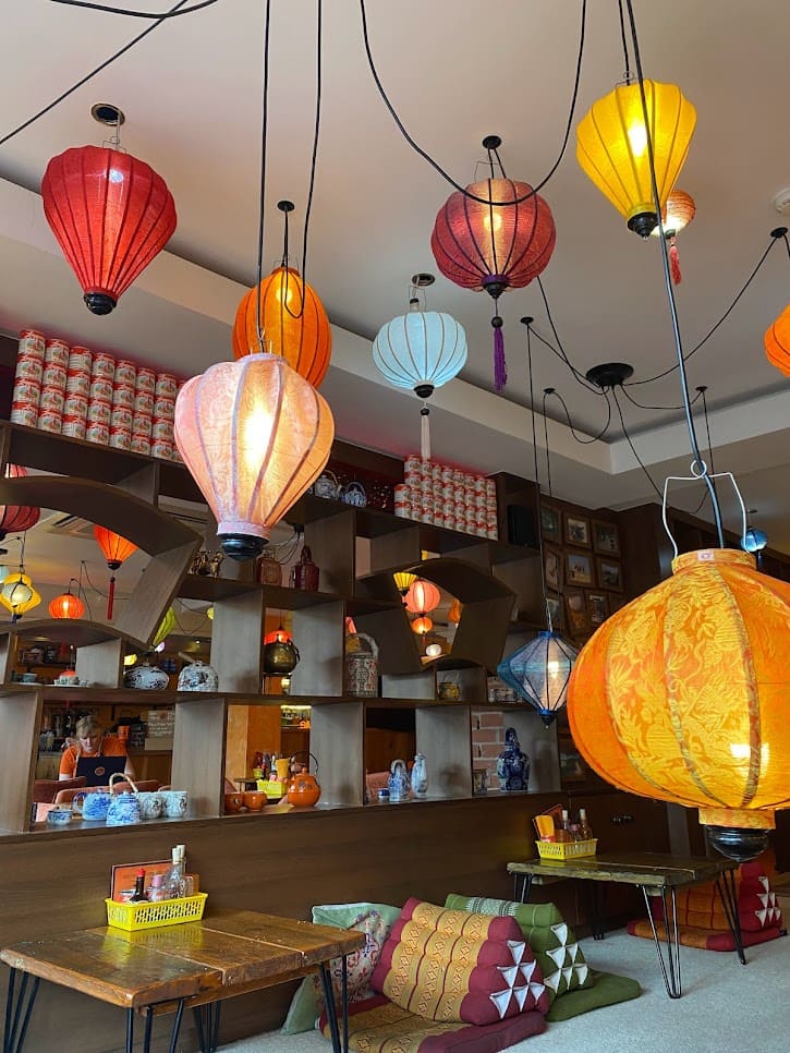 The orange lantern-filled cozy interior of Nam Song Vietnamese Restaurant in Broomhill, Sheffield
